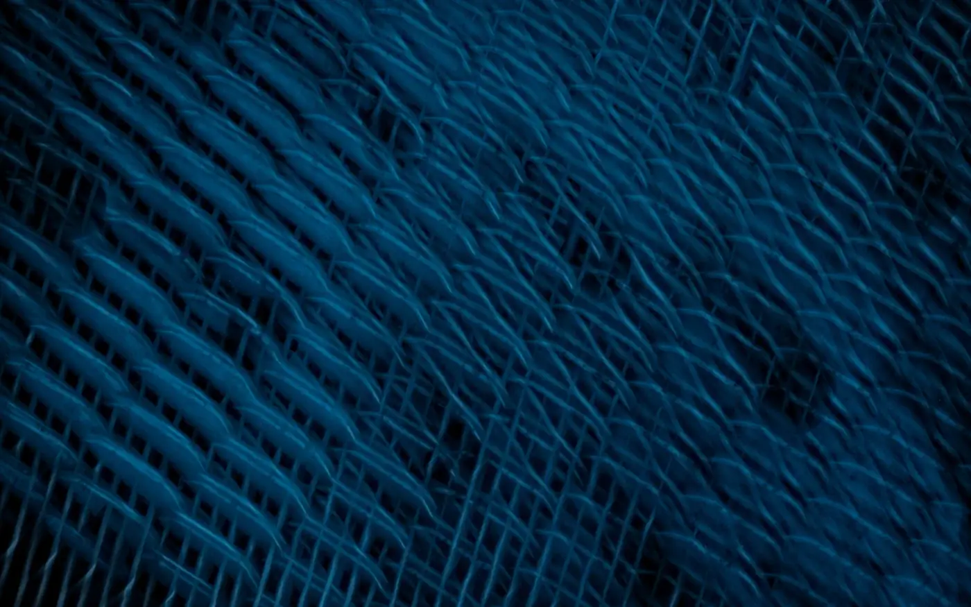 An abstract woven blue texture